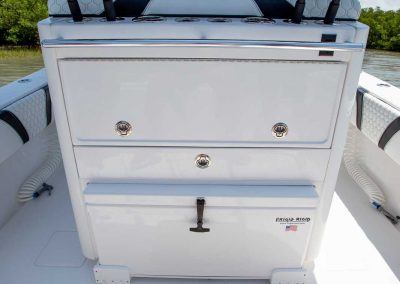 Tackle center and slide out cooler with rodholders Contender Boats ST  interior